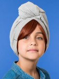Glatte Kinderfransen Les Franjynettes, weiche Kunstfaser, patentiertes Halteband Les Franjynes, ideal unter Turban oder Mütze