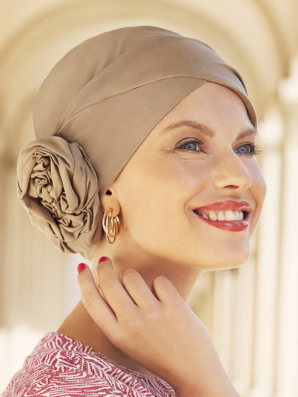 Turbanmütze Zuri Christine Headwear aus Supima-Baumwolle Caretech® mit integrierter Haarknoten-Blume, sanft für empfindliche Kop