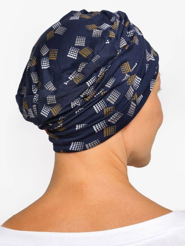 Chemo-Mütze Marlene Printed Rosette La Vedette aus Viskose, nahtlos, Volumeneffekt, sanft für empfindliche Kopfhaut