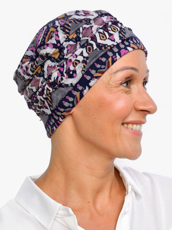 Chemo-Mütze Marlene Printed Rosette La Vedette aus Viskose, nahtlos, Volumeneffekt, sanft für empfindliche Kopfhaut