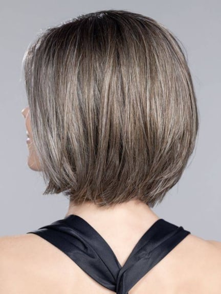 Elite Mono Part Perücke mit glatten mittellangen Haaren und variablem Pony