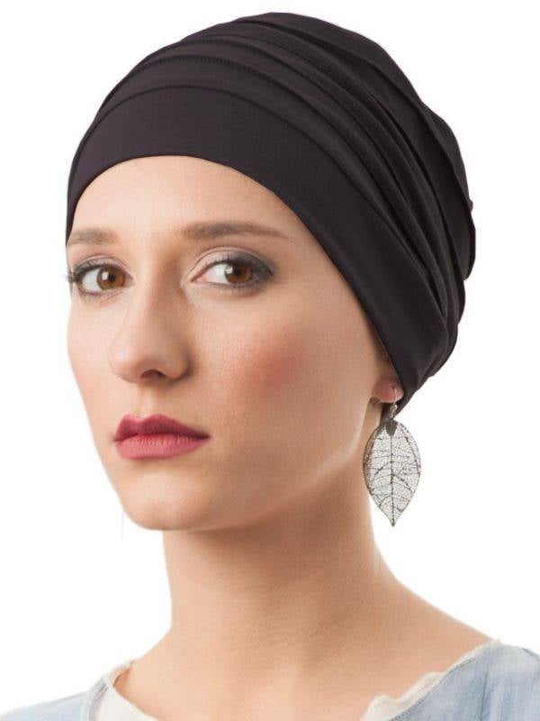 Turban Lola MMParis aus Bambusfaser, gefaltet, weich und atmungsaktiv, komfortables Accessoire für einen femininen Stil