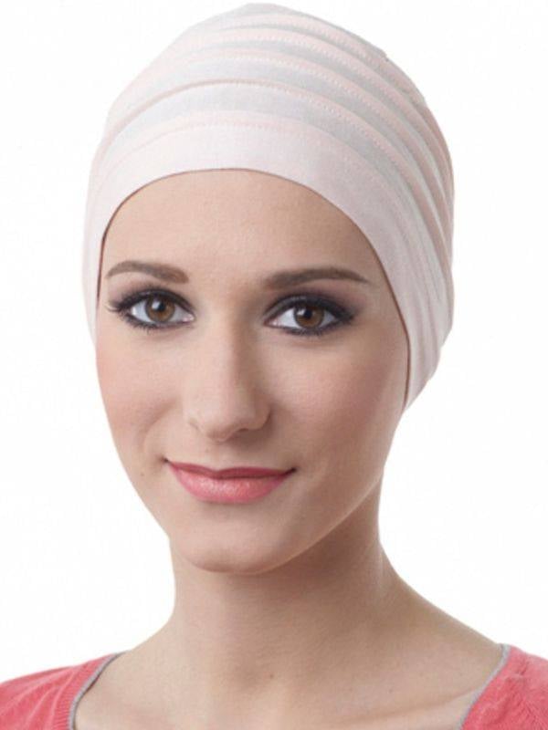 Turban Lola MMParis aus Bambusfaser, gefaltet, weich und atmungsaktiv, komfortables Accessoire für einen femininen Stil
