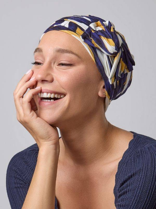 Turban Opéra NJ Création: leichter Turban mit großer, modulierbarer Schleife für elegantes Volumen, seitlich oder oben zu tragen