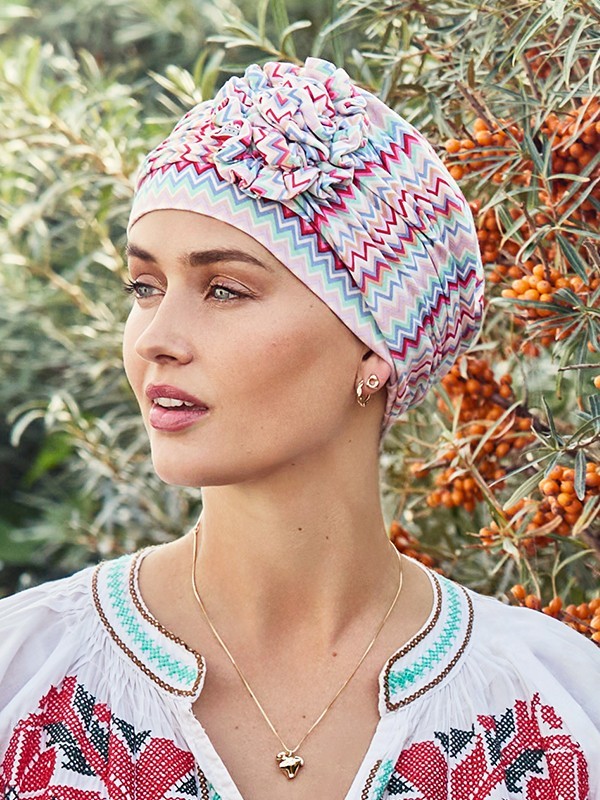 Turbanmütze Lotus Bambou Christine Headwear aus Bambus-Viskose Caretech®, weich und atmungsaktiv, mit aufgenähter Lotusblume.