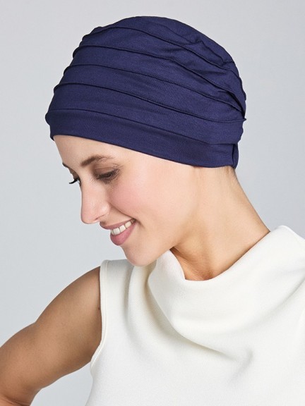 Entdecken Sie den Florida Turban von Gisela Mayer - leicht, plissiert und elegant