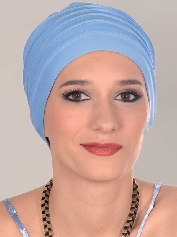 Turban Lola MMParis aus Bambusfaser, gefaltet, weich und atmungsaktiv, komfortables Accessoire für einen femininen Stil